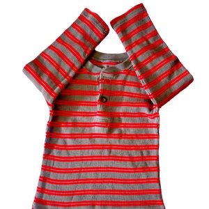 This red and grey shirt in size 4t is a perfect addition to your little one.